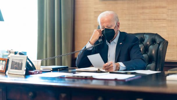 PHOTO: President Joe Biden talks on the phone with his national security team from the Treaty Room in the residence of the White House in Washington, Friday, July 22, 2022.  (Adam Schultz/The White House via AP)