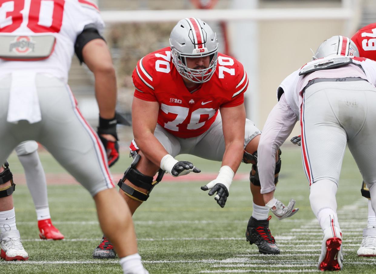 Team Buckeye offensive guard Josh Fryar (70) blocks during the Ohio State Buckeyes football spring game at Ohio Stadium in Columbus on Saturday, April 17, 2021. 