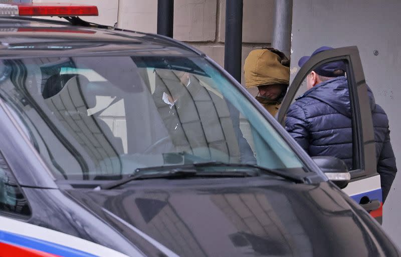 FILE PHOTO: Reporter for U.S. newspaper The Wall Street Journal Evan Gershkovich leaves a court building in Moscow