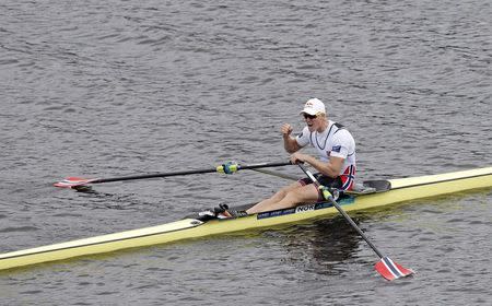 2018 European Championships - Rowing, Men's Single Sculls Final A - Strathclyde Country Park, Glasgow, Britain - August 5, 2018 - Kjetil Borch of Norway reacts after winning the race. REUTERS/Russell Cheyne