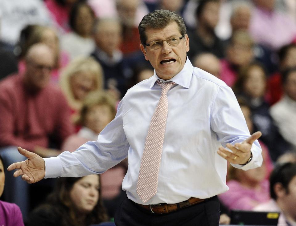 Connecticut head coach Geno Auriemma gestures during the second half of an NCAA college basketball game against Louisville, Sunday, Feb. 9, 2014, in Storrs, Conn. Connecticut won 81-64. (AP Photo/Jessica Hill)