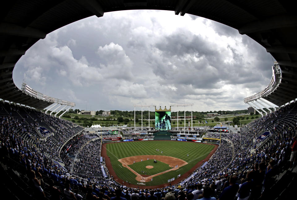 FILE - Clouds gather over Kauffman Stadium before a baseball game between the Kansas City Royals and the Cleveland Indians, Sunday, June 4, 2017, in Kansas City, Mo. Voter rejection of a stadium sales tax plan for the Kansas City Royals and Chiefs has raised questions about what happens next. (AP Photo/Charlie Riedel, File)