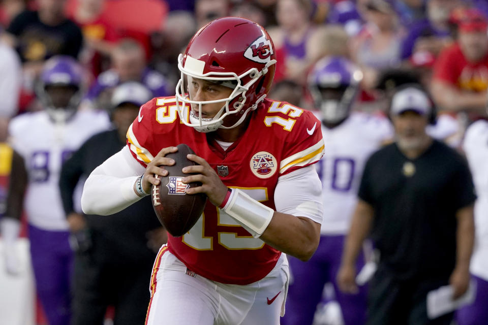 Kansas City Chiefs quarterback Patrick Mahomes drops back to pass during the first half of an NFL football game against the Minnesota Vikings Friday, Aug. 27, 2021, in Kansas City, Mo. (AP Photo/Ed Zurga)