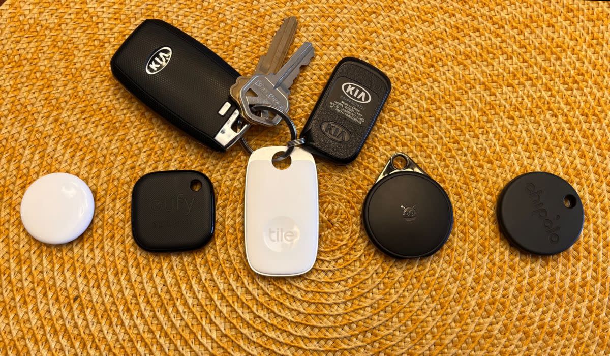From left to right: The Apple AirTag, Eufy SmartTrack Link, Tile Pro, Pebblebee Clip and Chipolo One Spot are all roughly the same size. (Photo: Rick Broida/Yahoo)