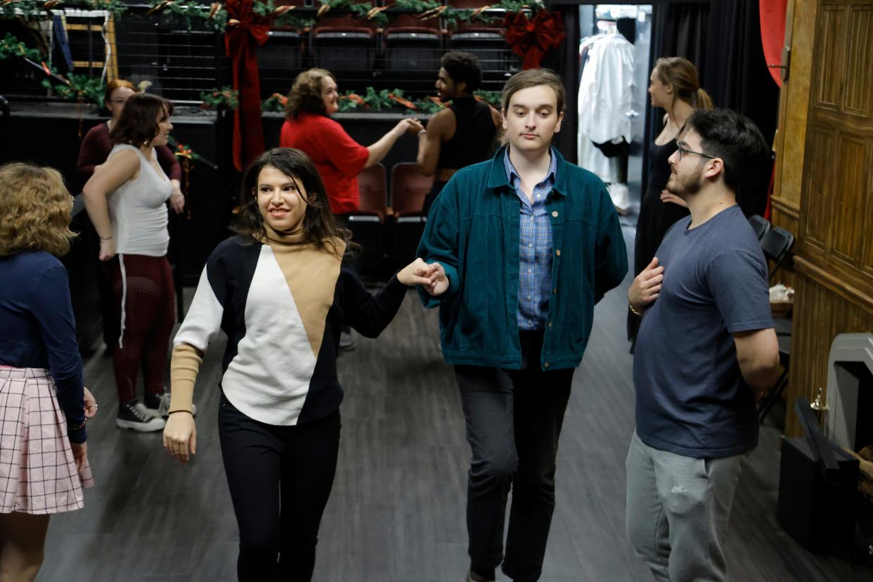 Evan Wolfe, right, and Ariana Sophia rehearse a Regency Era dance for Oklahoma Shakespeare in the Park's production of "Jane Austen's Christmas Cracker" in Oklahoma City.