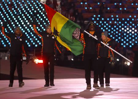 Pyeongchang 2018 Winter Olympics – Opening ceremony – Pyeongchang Olympic Stadium - Pyeongchang, South Korea – February 9, 2018 - Akwasi Frimpong of Ghana carries the national flag. REUTERS/Kai Pfaffenbach