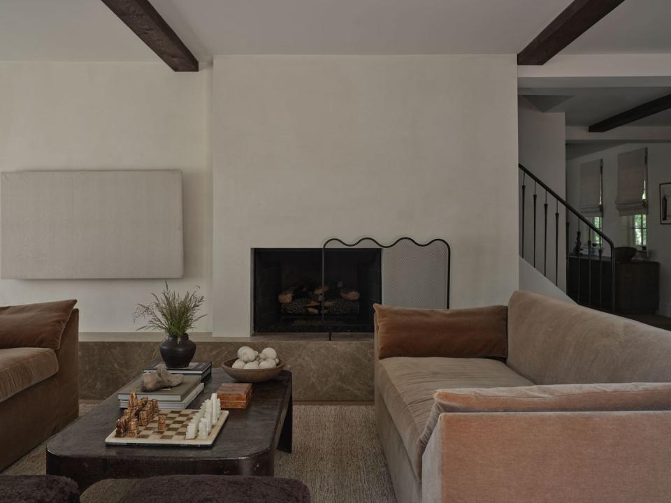 a living room with a fireplace