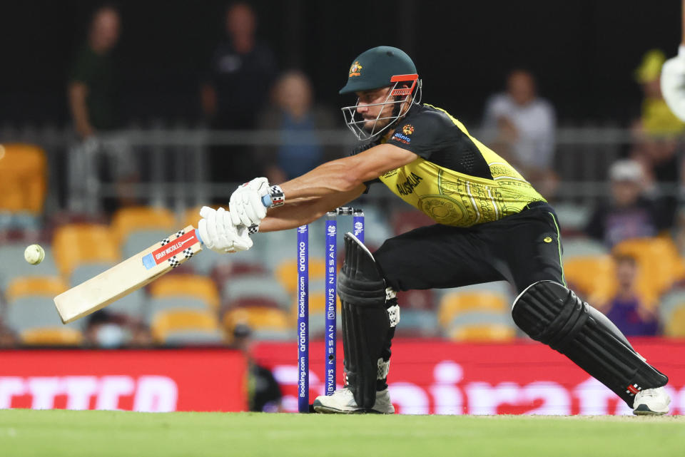 Ireland's George Dockrell reacts during the T20 World Cup cricket match between Australia and Ireland, in Brisbane Australia, Monday, Oct. 31, 2022. (AP Photo/Tertius Pickard)