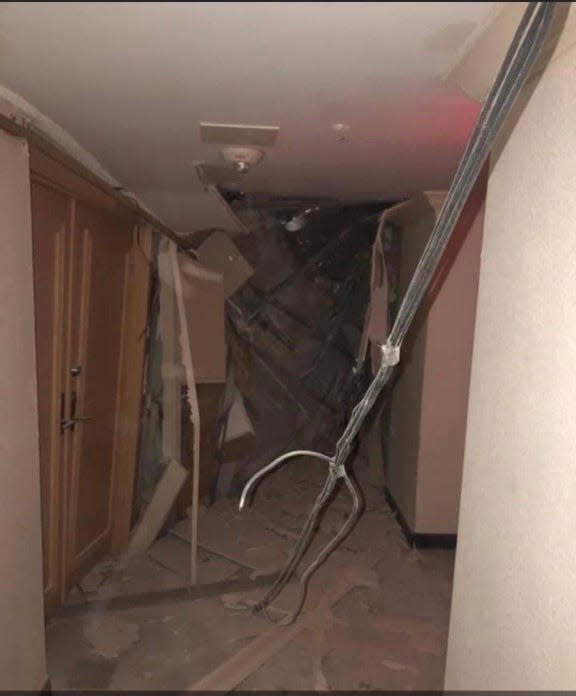 A picture of the collapsed hallway in the Champlain Tower building.