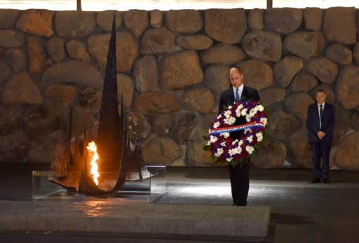 Britain's Prince William lays a wreath during a visit to the Yad Vashem Holocaust memorial in Jerusalem on June 26, 2018