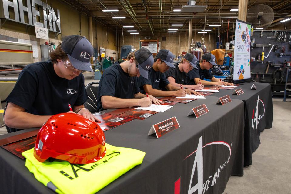 Five Fond du Lac youth apprentices participate in J. F. Ahern's signing day to move to full-time employment May 8, 2024.