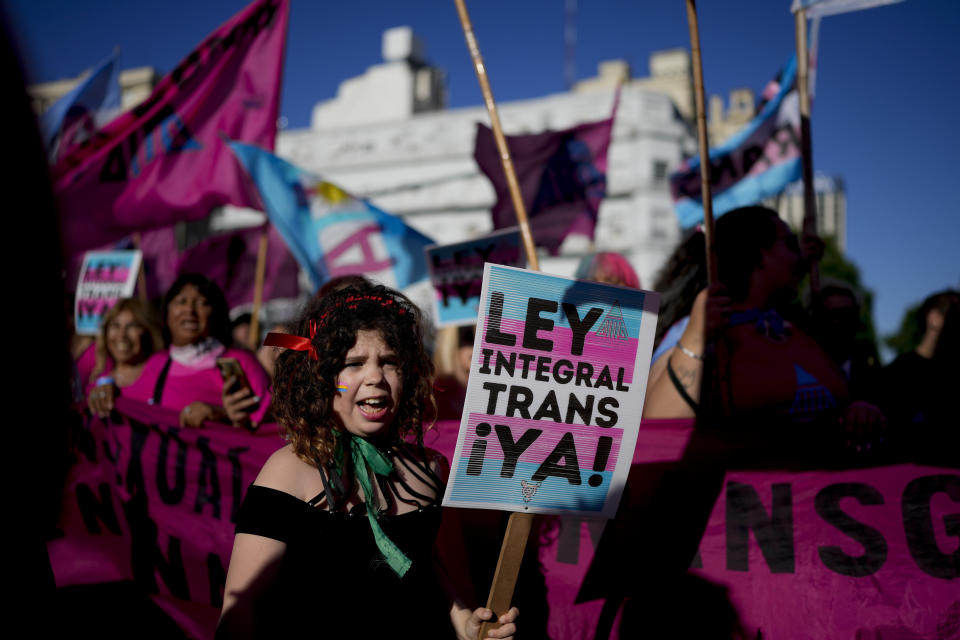Trans girl Elizabeth Reinaga Amorena marches with members of the Latin American Movement of Mothers of LGTB+ Children, in Buenos Aires Argentina, Saturday, Nov. 5, 2022. Argentina and Uruguay have been pioneers in marriage equality and transgender rights. (AP Photo/Natacha Pisarenko)