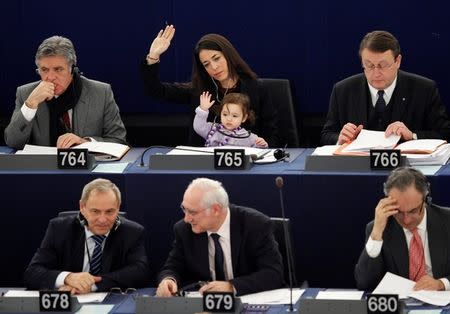FILE PHOTO: Italy's Member of the European Parliament Licia Ronzulli (top C) takes part with her daughter Vittoria in a voting session at the European Parliament in Strasbourg February 15, 2012. REUTERS/Vincent Kessler/File Photo