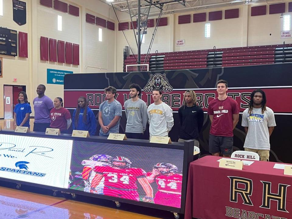 Rock Hill High School signees stand for group photos.