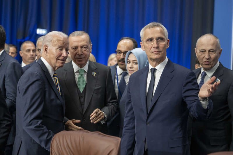 U.S. President Joe Biden (L), Turkish President Recep Tayyip Erdogan (C), and NATO Secretary General Jens Stoltenberg (R) are seen as they arrive to attend the second day of the NATO Summit meeting on July 12, 2023 in Vilnius, Lithuania. Photo by Turkish President Press Office/ UPI