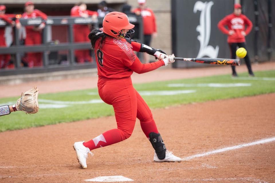 Taylor Roby hits the ball during a Louisville softball game against Boston College on April 29, 2023, at Ulmer Stadium in Louisville, Ky. Roby has played five seasons with the Cardinals after graduating early from Bullitt East High School.