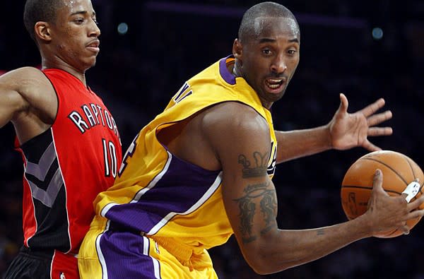 Lakers guard Kobe Bryant makes his season debut Sunday against high-flying guard DeMar DeRozan and the Raptors. Above, DeRozan and Bryant in a game three seasons ago.