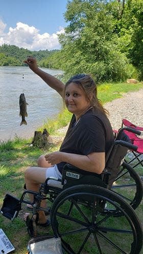 Karen Ball's friend took her on a rare trip outside her house to a river. She had a heart attack May 2 that led to two surgeries and a blood infection from a catheter, according to hospital records.