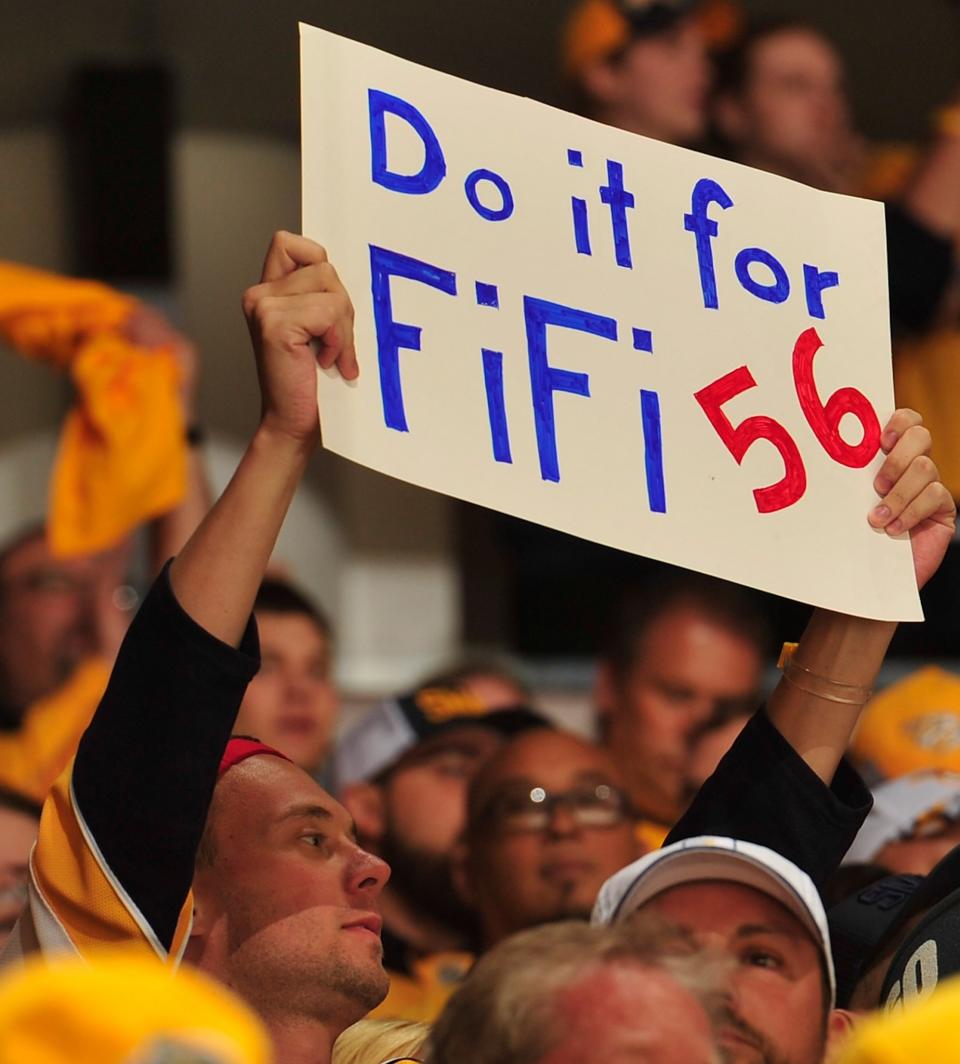 <p>A fan of the Nashville Predators player Kevin Fiala holds up a sign during the first period in Game Three of the Western Conference Second Round against the St. Louis Blues during the 2017 NHL Stanley Cup Playoffs at Bridgestone Arena on April 30, 2017 in Nashville, Tennessee. Fiala suffered a season ending injury earlier in the series. (Photo by Frederick Breedon/Getty Images) </p>