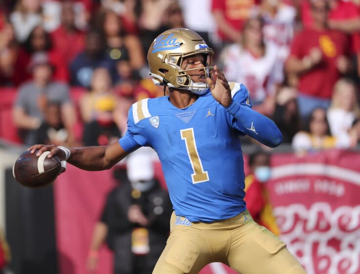 Los Angeles, CA - November 20: UCLA quarterback Dorian Thompson-Robinson throws a pass against USC.