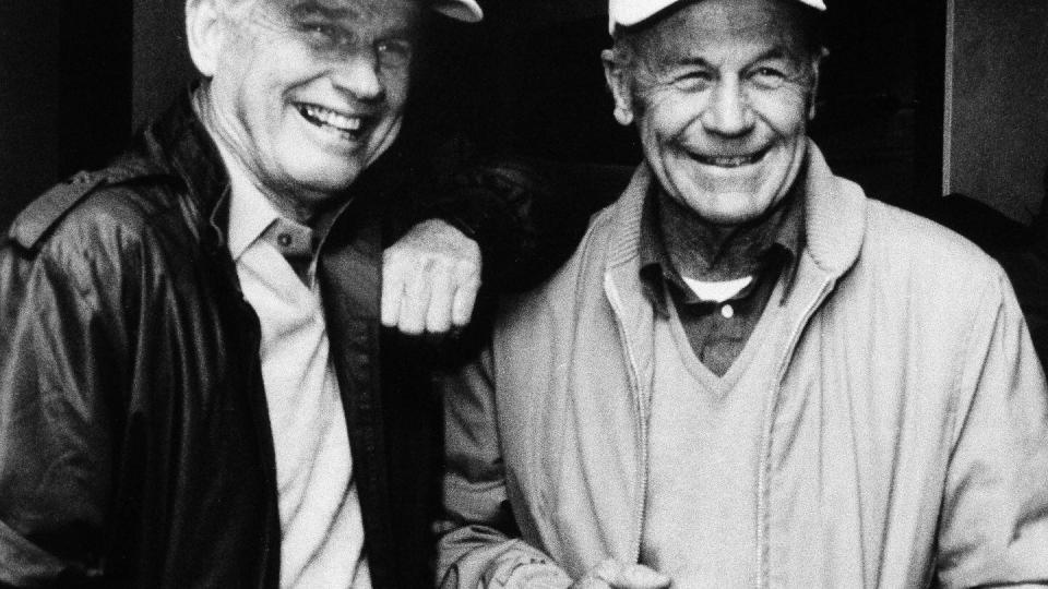 Retired Brig. Gen. Chuck Yeager, right, smiles with his flight companion, Clarence E. 
