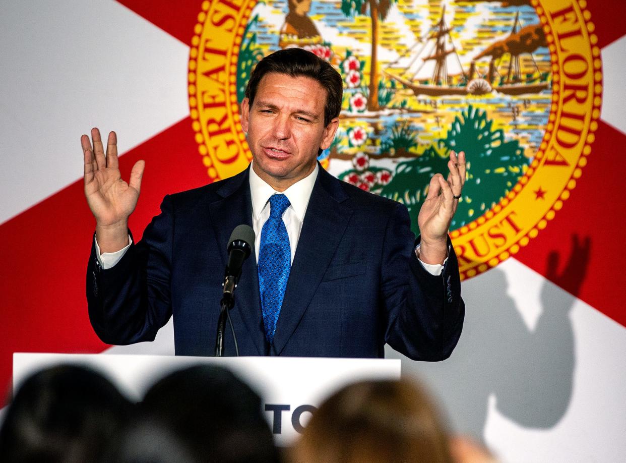 Gov. Ron DeSantis criticizes COVID-19 lockdown orders during a visit with supporters at the Fire restaurant in Winter Haven on March 16. Accompanying him to the event was Florida Surgeon General Joseph Ladapo.