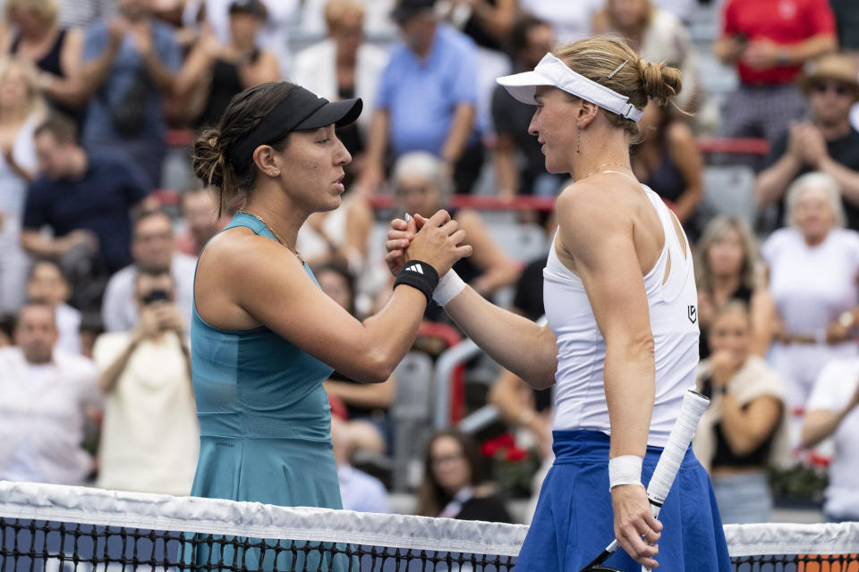 Jessica Pegula, of the United States, shakes hands with Liudmila Samsonova, of Russia, following Pegula's win in the finals of the National Bank Open women's tennis tournament in Montreal, Sunday, Aug. 13, 2023. (Christinne Muschi/The Canadian Press via AP)