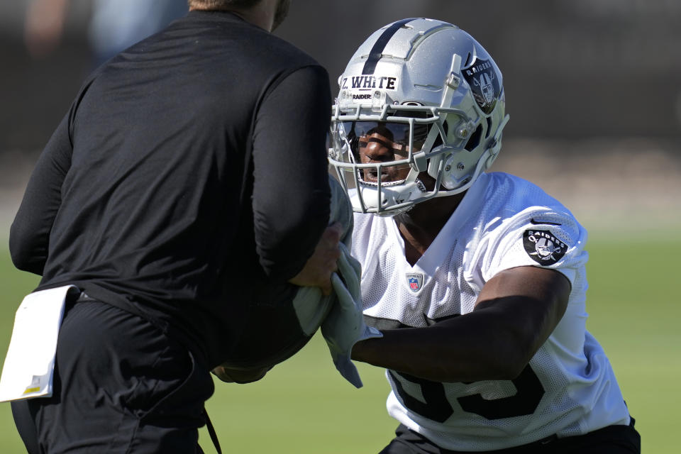 Las Vegas Raiders' Zamir White practices during NFL football training camp, Thursday, July 21, 2022, in Henderson, Nev. (AP Photo/John Locher)