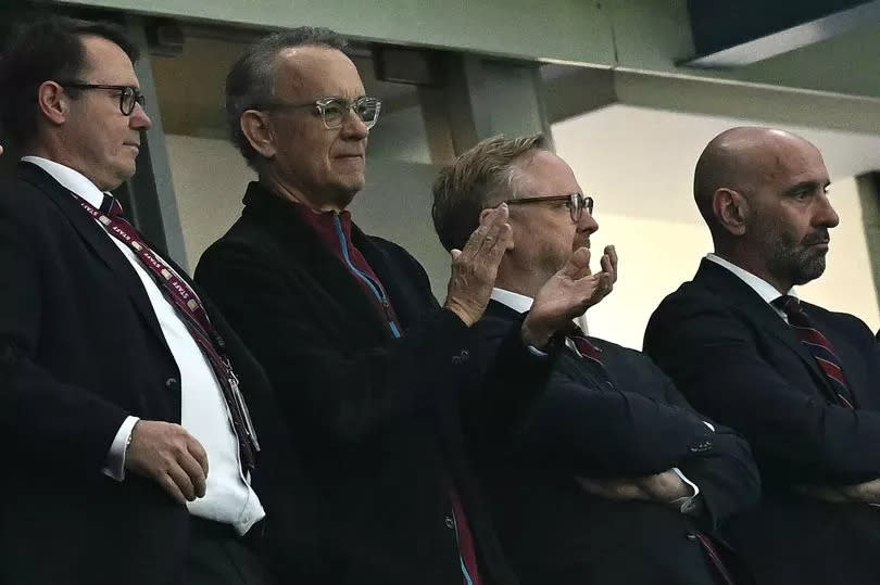 US actor Tom Hanks applauds ahead of the Premier League football match between Aston Villa and Liverpool at Villa Park on May 13 2024