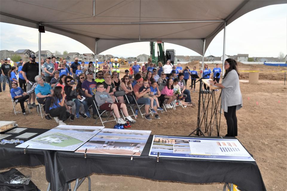 Principal Shelly Butcher speaks at a groundbreaking ceremony Tuesday, May 2, 2023, for the new Peakview Elementary School in Windsor, Colo., scheduled to open in the fall of 2024.