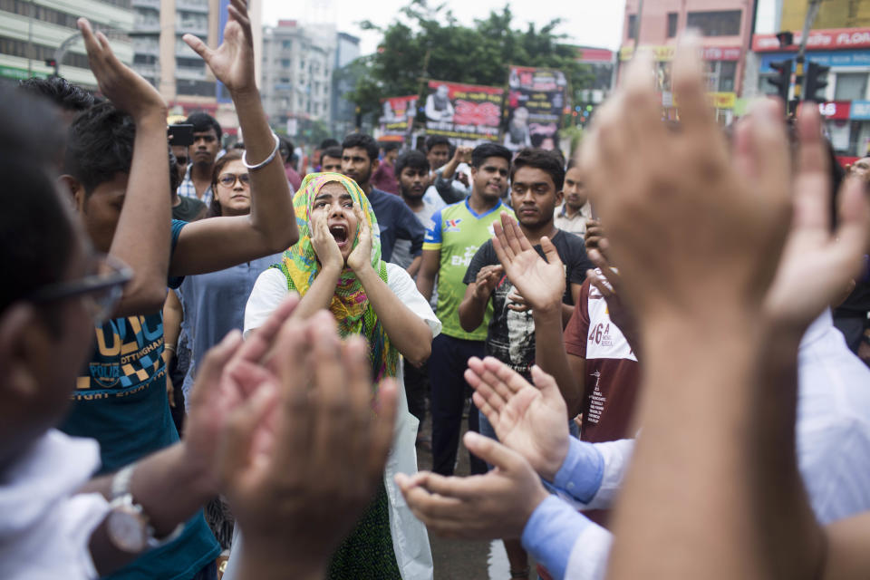 Bangladeshi students shout slogans as they block a road during a protest in Dhaka, Bangladesh, Thursday, Aug. 2, 2018. Students blocked several main streets in the capital, protesting the death of two college students in a bus accident in Dhaka. (AP Photo/A. M. Ahad)