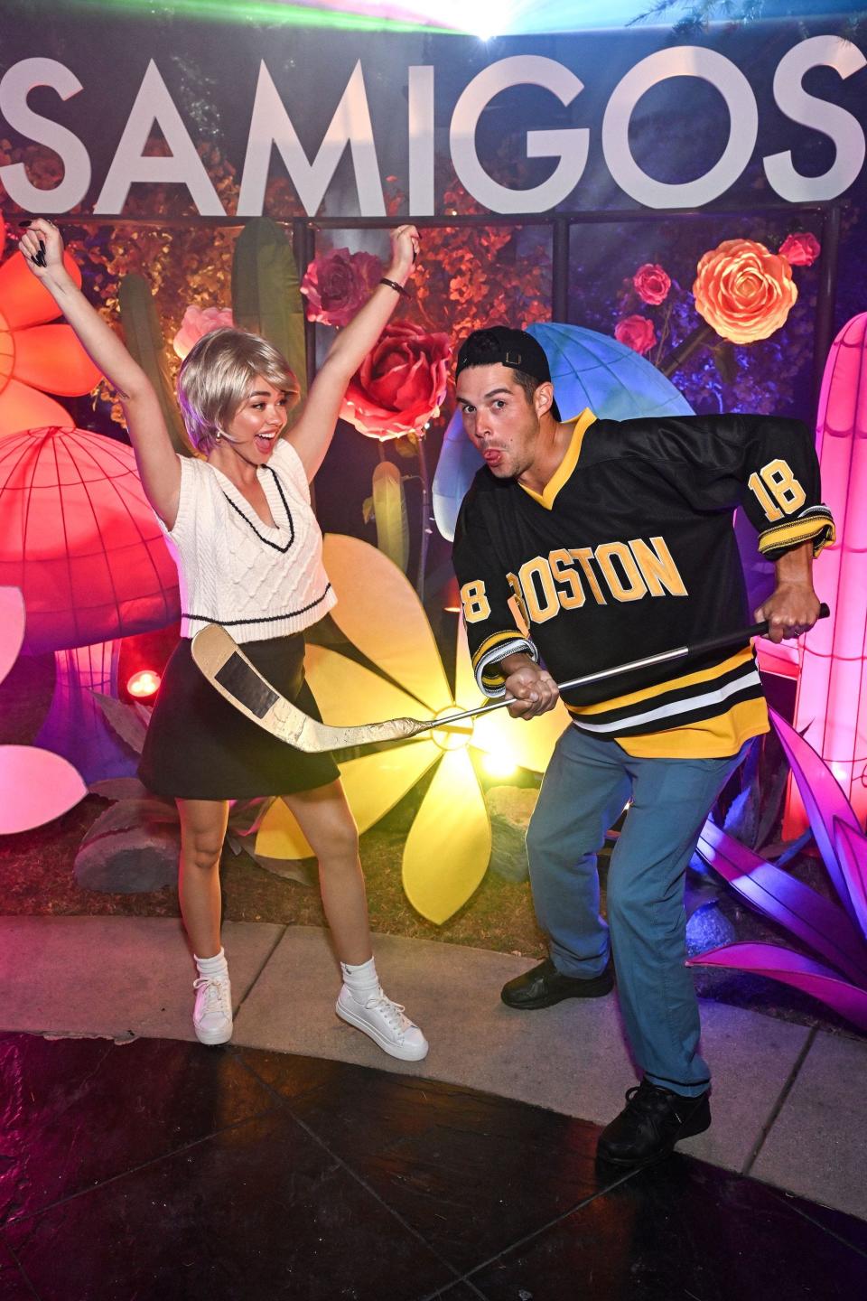 Sarah Hyland and Wells Adams attend a Halloween party.