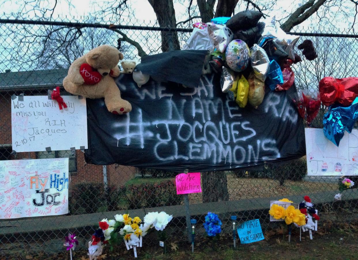In this Feb. 14, 2017, file photo, a memorial is set up in a neighborhood where Nashville Officer Josh Lippert shot Jocques Scott Clemmons in Nashville, Tenn. Federal officials on Friday, Aug. 4, 2017, agreed with a state decision not to prosecute Lipper, a white Tennessee police officer, who fatally shot Clemmons, a black man, after a traffic stop.