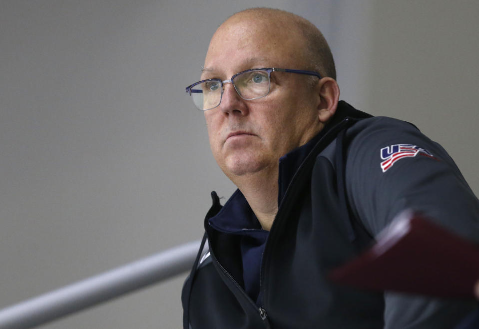 FILE - In this Dec. 17, 2017, file photo, United States' under-20 hockey coach Bob Motzko watches his team scrimmage during hockey practice in Columbus, Ohio. The NCAA men's hockey tournament bracket this year would have made Herb Brooks proud. For the first time, all five Division I programs from Minnesota made the 16-team field. Minnesota is the No. 3 overall seed. (AP Photo/Jay LaPrete, File)