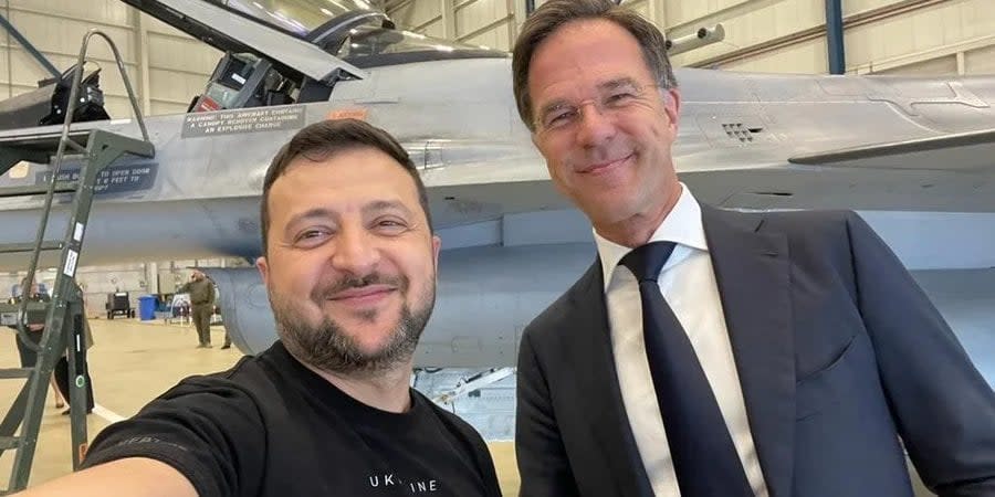 Volodymyr Zelenskyy and Dutch Prime Minister Mark Rutte near the F-16 at Eindhoven Air Base in the Netherlands