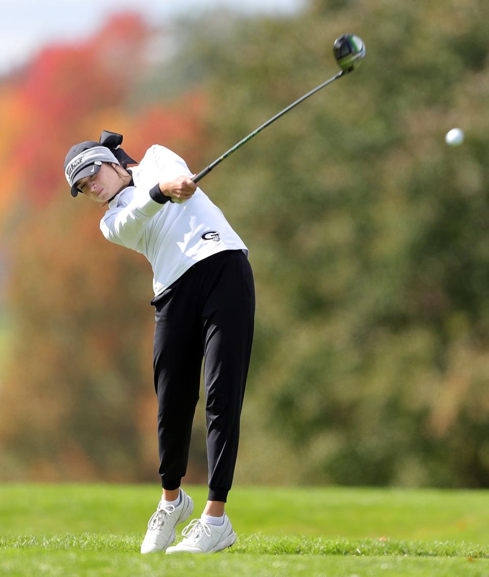 Green's Ava Pulley drives her ball down the fairway on No. 2 during the Division I girls district golf tournament at Brookledge Golf Club, Thursday, Oct. 13, 2022, in Cuyahoga Falls.