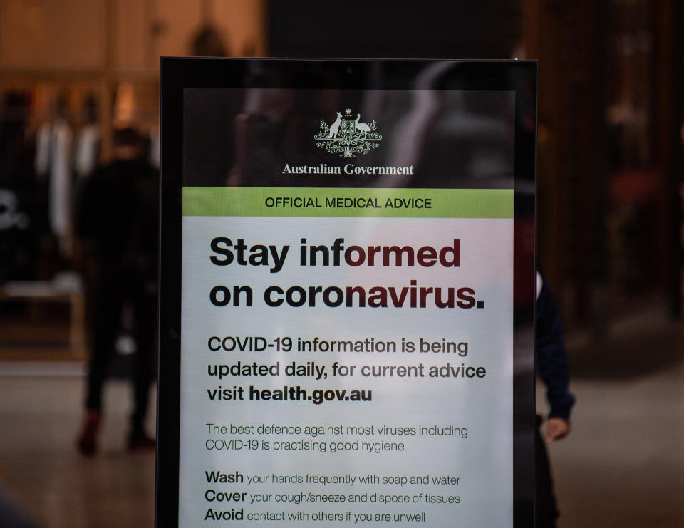 An advertising board showing a government notice about coronavirus in Sydney, Monday, March 16, 2020. Source: AAP Image.