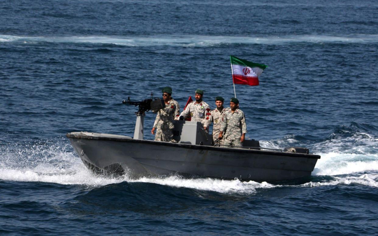 Iranian soldiers take part in the 
