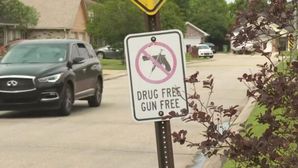 A sign is shown on the block where nine children were shot at a 12-year-old’s birthday party in LaPlace, Louisiana this weekend after a “verbal confrontation” broke out at a private home. (WWL-TV)