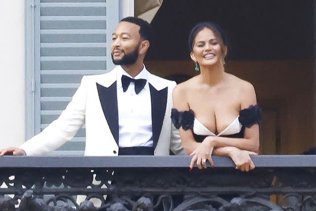 <p>Pedro Elena / SplashNews.com</p> Chrissy Teigen and John Legend on the balcony of Villa Passalacqua during their 10th wedding anniversary celebrations last weekend