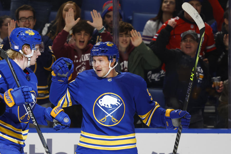 Buffalo Sabres left wing Jeff Skinner (53) celebrates his goal with defenseman Rasmus Dahlin (26) during the first period of an NHL hockey game against the Vancouver Canucks, Tuesday, Nov. 15, 2022, in Buffalo, N.Y. (AP Photo/Jeffrey T. Barnes)