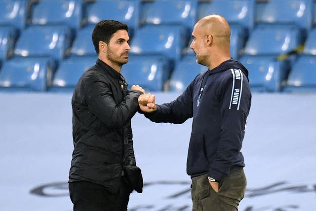 Arsenal manager Mikel Arteta greets Manchester City boss Pep Guardiola