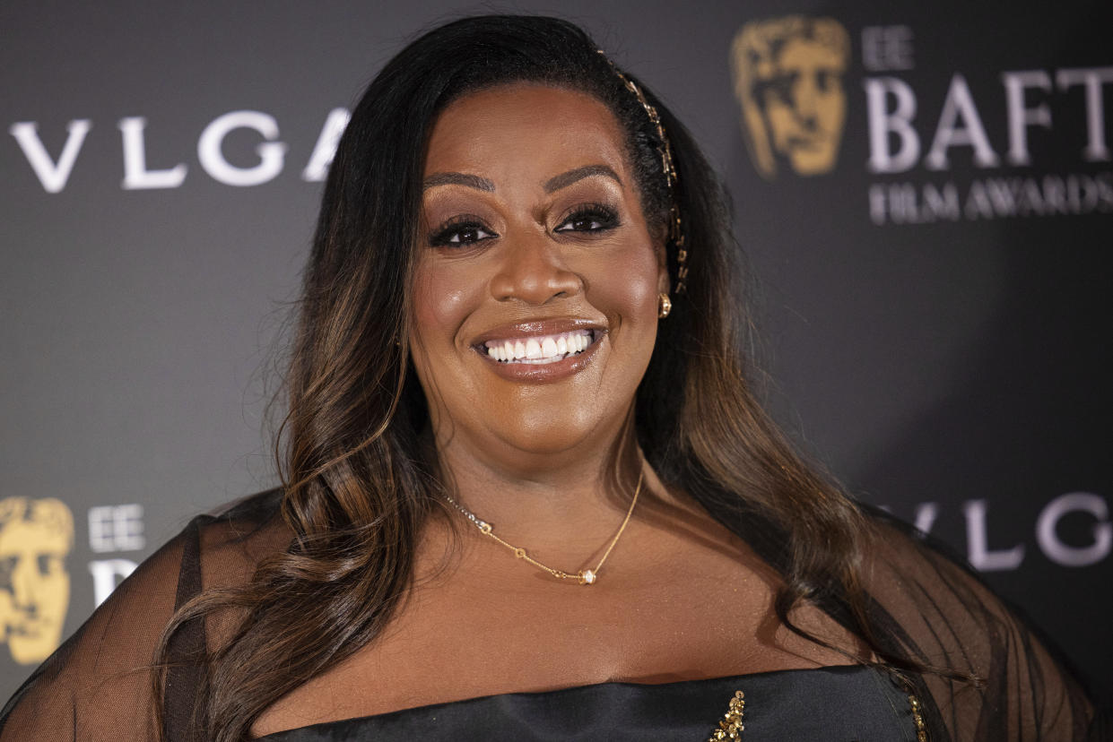 Alison Hammond poses for photographers upon arrival for the BAFTA Nominees Party in London, Saturday, Feb. 18, 2023 (Photo by Vianney Le Caer/Invision/AP)