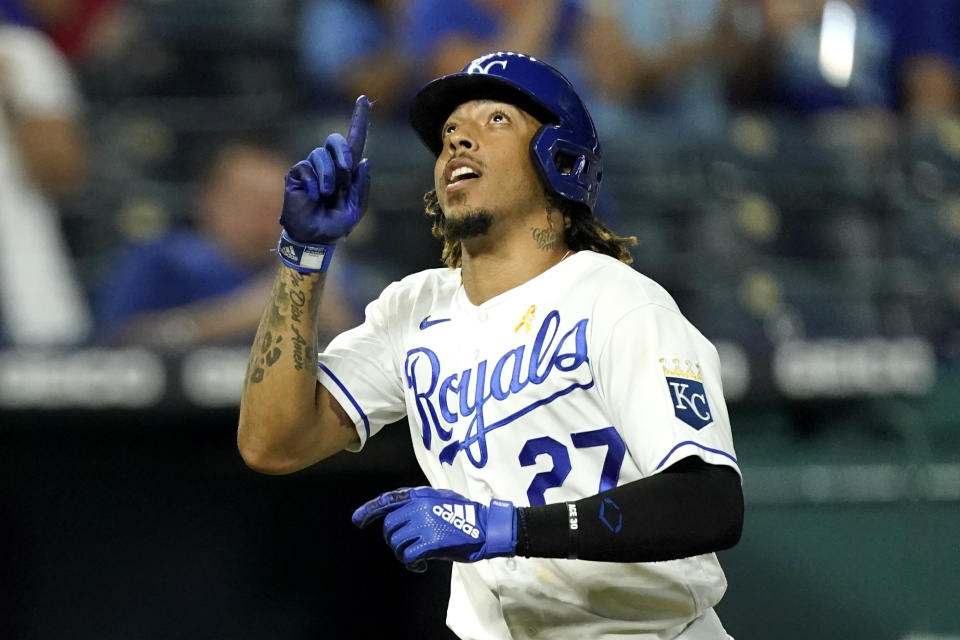 Kansas City Royals' Adalberto Mondesi celebrates as he crosses the plate after hitting a solo home run during the fourth inning of a baseball game against the Cleveland Indians Wednesday, Sept. 1, 2021, in Kansas City, Mo. (AP Photo/Charlie Riedel)