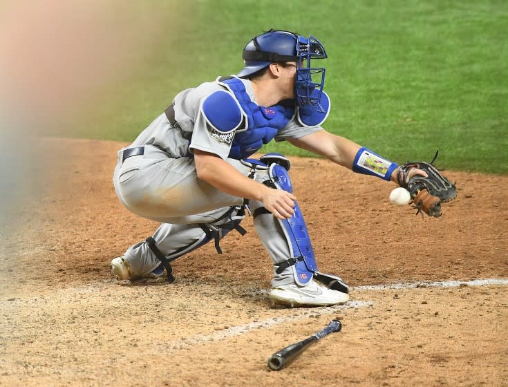 ARLINGTON, TEXAS OCTOBER 24, 2020-Dodgers catcher Will Smith drops the ball.