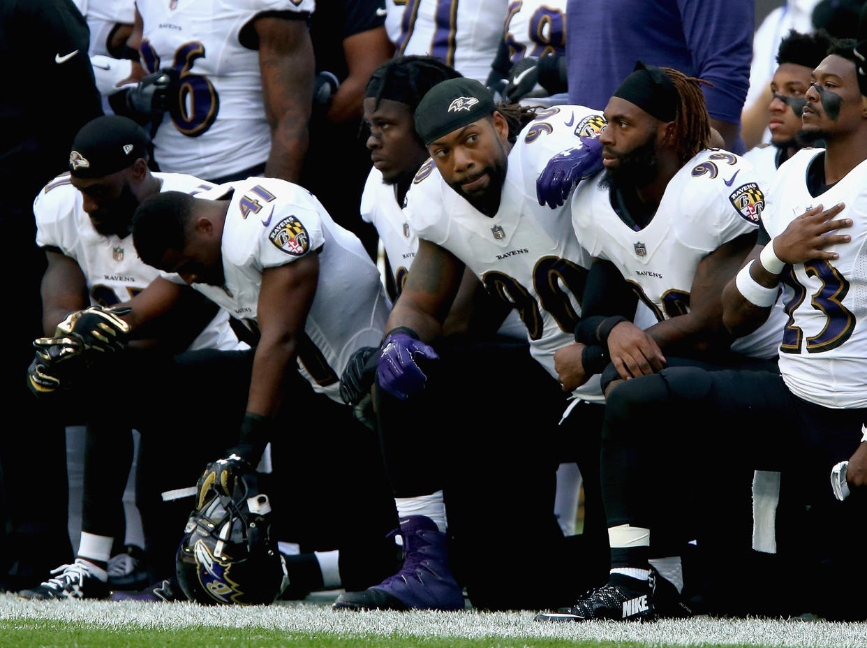 Players from both sides elected to kneel during the playing of the anthem at Wembley: Getty