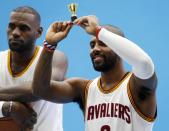 <p>LeBron James does not find miniature trophies all that funny. (AP) </p>