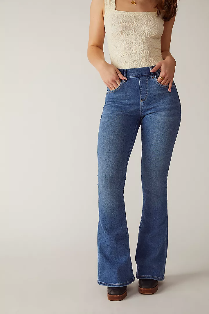 <p><a href="https://go.redirectingat.com?id=74968X1596630&url=https%3A%2F%2Fwww.freepeople.com%2Fshop%2Fcrvy-infinite-stretch-pull-on-flare-jeans%2F%3Fcategory%3Djeans%26color%3D040%26type%3DREGULAR%26quantity%3D1&sref=https%3A%2F%2Fwww.oprahdaily.com%2Fstyle%2Fg23598227%2Fbest-plus-size-jeans%2F" rel="nofollow noopener" target="_blank" data-ylk="slk:Shop Now;elm:context_link;itc:0;sec:content-canvas" class="link ">Shop Now</a></p><p>CRVY Infinite Stretch Pull-On Flare Jeans</p><p>Free People</p><p>$98.00</p><span class="copyright">Free People</span>