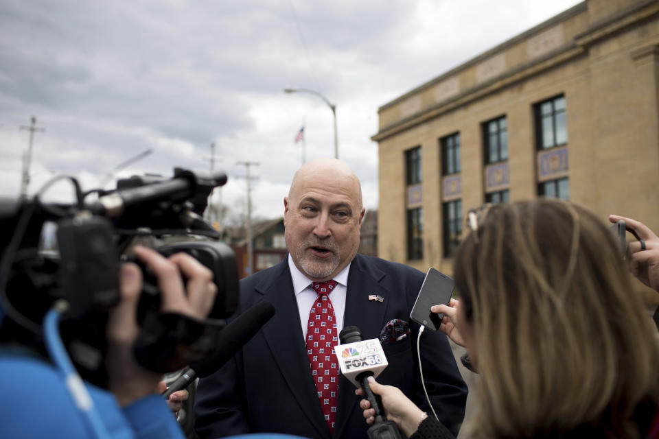 Retired Bishop Airport police Lt. Jeff Neville speaks to reporters outside the federal courthouse in Flint, Mich., Thursday, April 18, 2019. Amor Ftouhi, of Canada, convicted of terrorism for nearly killing Neville in June 2017, was sentenced Thursday to life in prison after defiantly declaring he had no regrets and only wished he had carried a machine gun that day instead of a knife. (Kaiti Sullivan/The Flint Journal via AP)