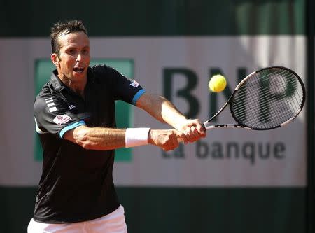 Radek Stepanek of the Czech Republic plays a shot to compatriot Tomas Berdych during their men's singles match at the French Open tennis tournament at the Roland Garros stadium in Paris, France, May 27, 2015. REUTERS/Pascal Rossignol